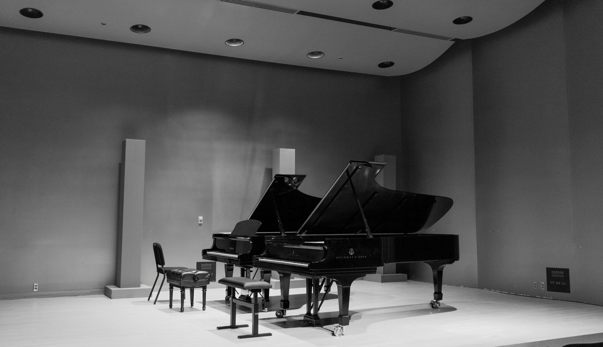A grand piano setup in a concert hall in Montreal, perfect for classical performances.