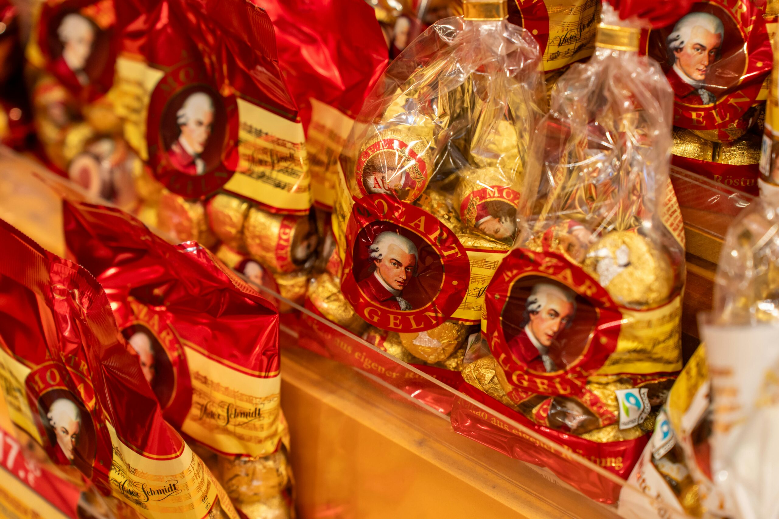 Close-up of Mozartkugeln chocolates in Vienna shop showcasing Austrian confectionery.